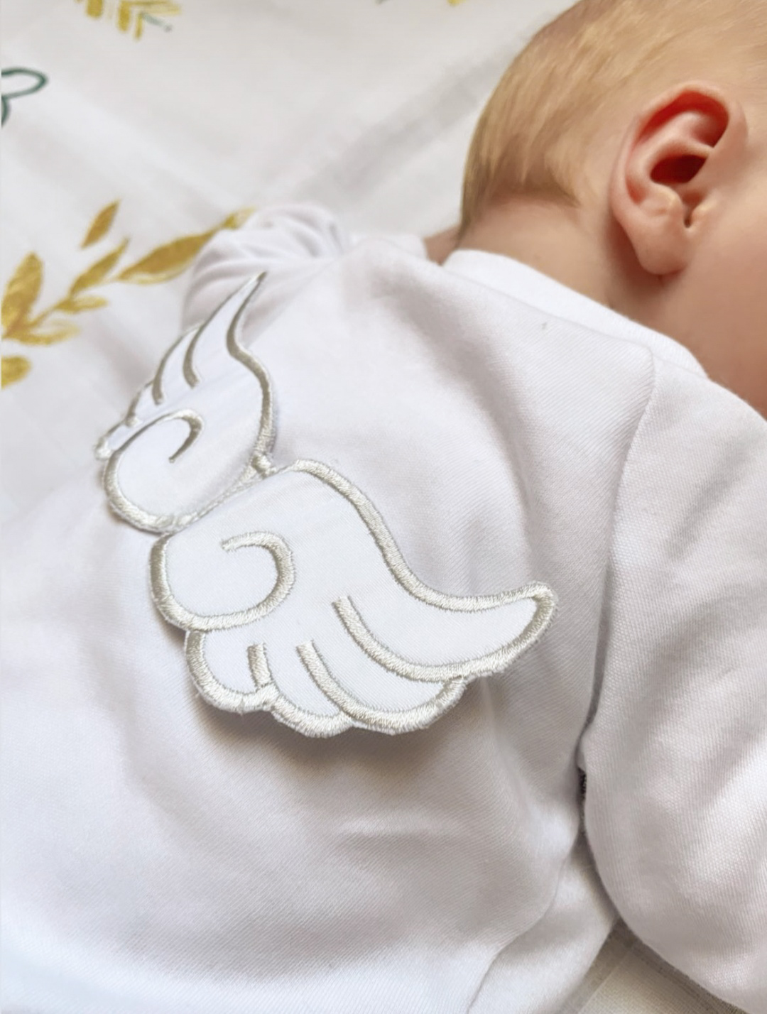 Крильця на спинці сліпа/боді